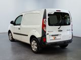 a white van that is parked in a room