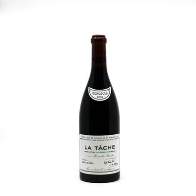 a bottle of wine that is sitting on a table