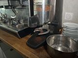 a coffee maker on the counter in the kitchen