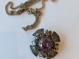 Collier en argent et améthore avec une pierre violette au centre