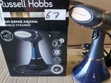 a box of russell hobbss hair dryer next to a box of other items