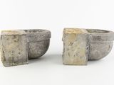 pair of stone bowls on white background with no one in the photo