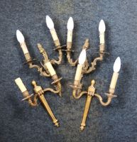 DEUX PAIRES D'APPLIQUES à deux bras de lumière en laiton et …