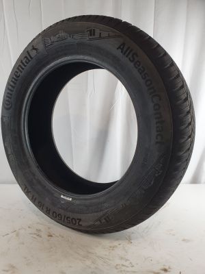 a close up of a tire on a white surface with a white background
