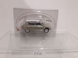 a small toy car in a clear display case