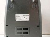 an image of a remote control and a mouse on a table