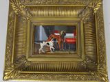 tableau représentant deux chiens et une borne d'incendie, dans un cadre doré