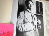 a book with a picture of a man in a suit and tie