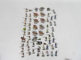 a lot of miniature figurines that are on the table