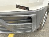 the front bumper of a car with a sticker on it ' s bumper