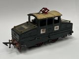 a toy train on a white surface with a white background
