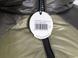a close up of a jacket with a price tag on it