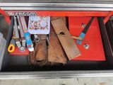 a tool box with tools in it on the floor