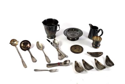 many different types of silverware on the table