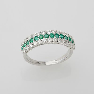 an emerald and diamond ring