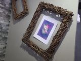 a picture hanging on the wall of a bathroom