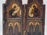 an image of a pair of antique religious paintings on a white background