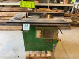 a table saw on a pallet in a workshop
