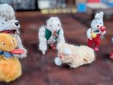 a bunch of stuffed animals that are sitting on a table