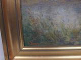 an oil painting of a field with grass and flowers in a gold frame
