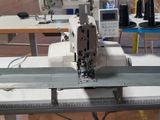 a sewing machine that is sitting on a table