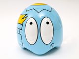 a blue toy with a yellow and black face