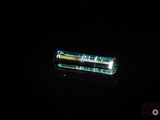 an image of a flashlight in the dark with a black background