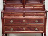 an image of a wooden dresser with glass doors