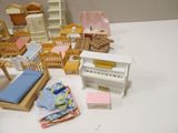 a white table with a bunch of toys on it