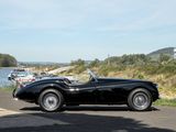 a black sports car parked on the side of the road