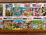 a lot of cartoon comics on the table together