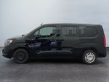 a black van that is parked in a parking lot