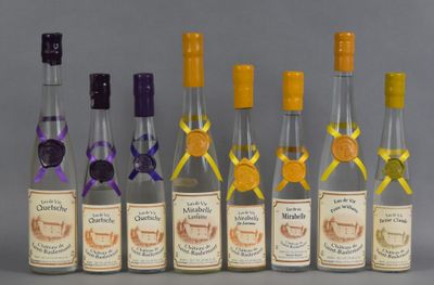 six bottles of wine are lined up in a row on a gray surface