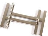 pair of silver colored cufflinks with a silver colored handle