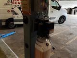an image of a machine that is in a garage