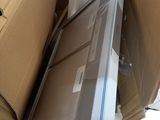 a box that is sitting on top of a refrigerator