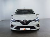 the front view of a white car in a white room