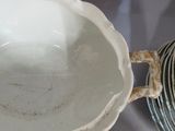 a lot of dishes that are sitting on a table