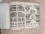an open book with a picture of a train on it