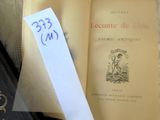 a book with a piece of paper on top of it