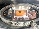 a close up of a car dashboard with a clock on it