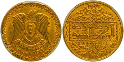 a gold coin with an eagle on the front and a gold eagle on the back