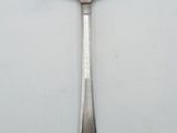 a spoon that is sitting on a table
