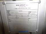 a picture of a sign on a machine that says scm group