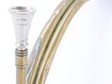 a close up view of a brass pipe on a white background