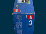 a blue box with a lego train on top of it