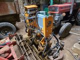 a small machine that is sitting in the middle of a room