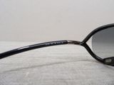a pair of glasses that are laying on a bed