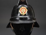 a close up of a fireman ' s helmet on a mannequin head