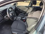 the interior of a car with the driver ' s seat down